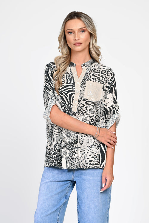 Bluză oversized cu imprimeu animal print și motive florale
